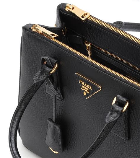 prada galleria saffiano small leather shoulder bag|More.